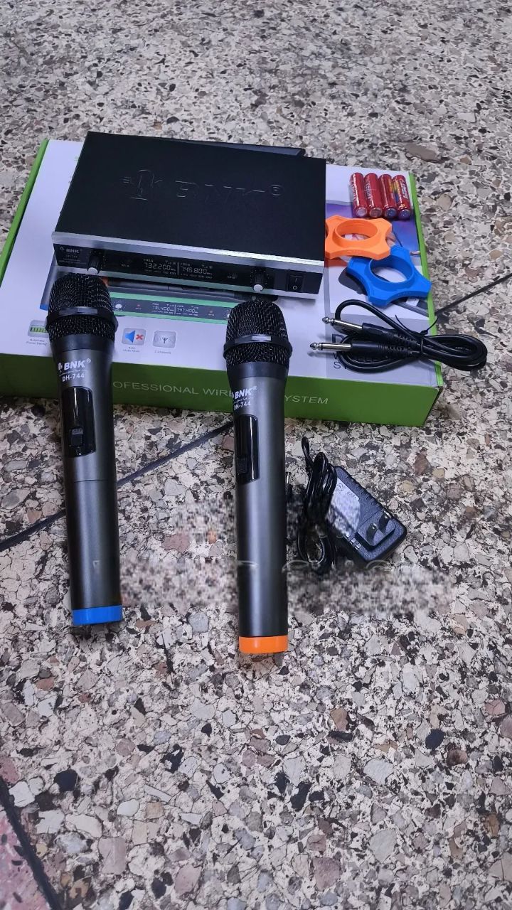 BNK Wireless Microphone System DH_744 – 2-Channel Professional UHF Wireless Mic with Auto Mute & Power Saving. A professional-grade wireless audio solution ideal for karaoke, events, conferences.