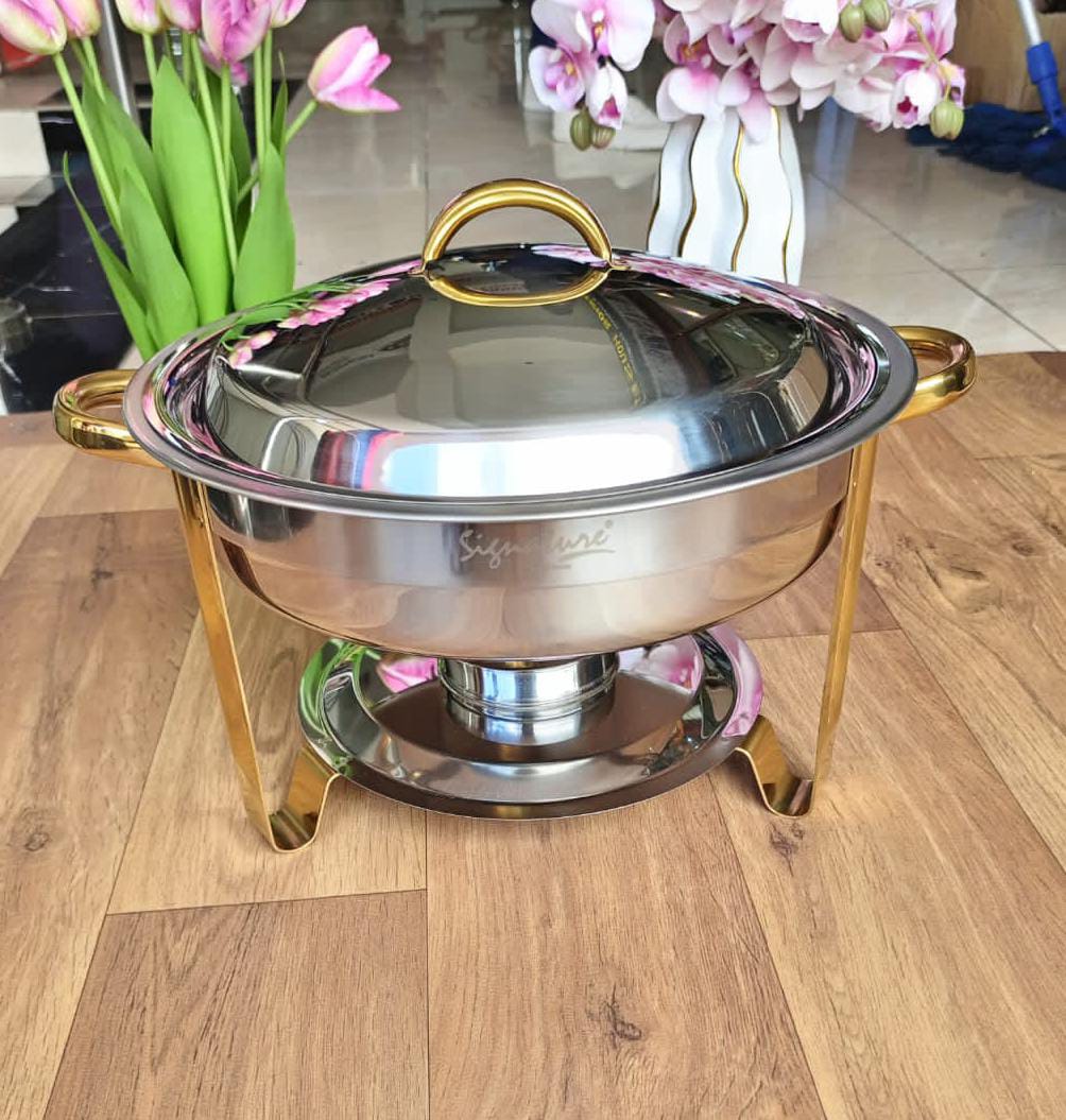 High quality stainless steel kitchen oval chaffing dish with golden stand and a capacity of 5 litres its classy and high quality