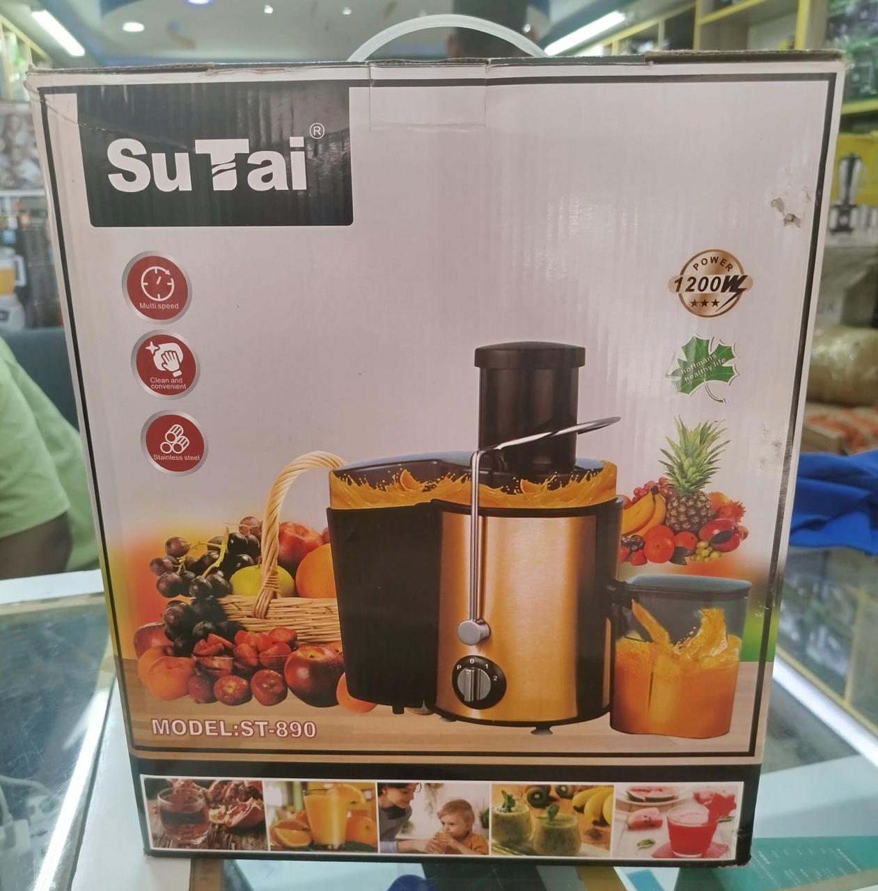 SUTAI 800 W JUICER EXTRACTOR - Powerful motor for mixing and grinding, Large food tube for inserting large fruits and vegetables, Smooth surface of the sieve for easy removal of the fibres .