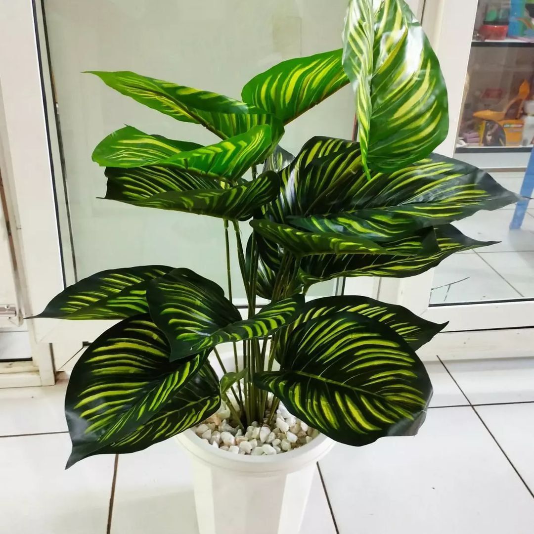 Artificial stripped  Flower with Decor stones and Vase - add a luxurious touch to your interior setting and the same time,