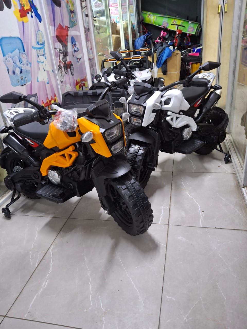 Kids electric motor bikes
Uses rechargeable battery 
Comes with adapter charger 
Has usb music player 
Has  a hand accelerator 
Has built-in nursery rhymes 
Ages 3-10yrs 
Capacity  40kgs