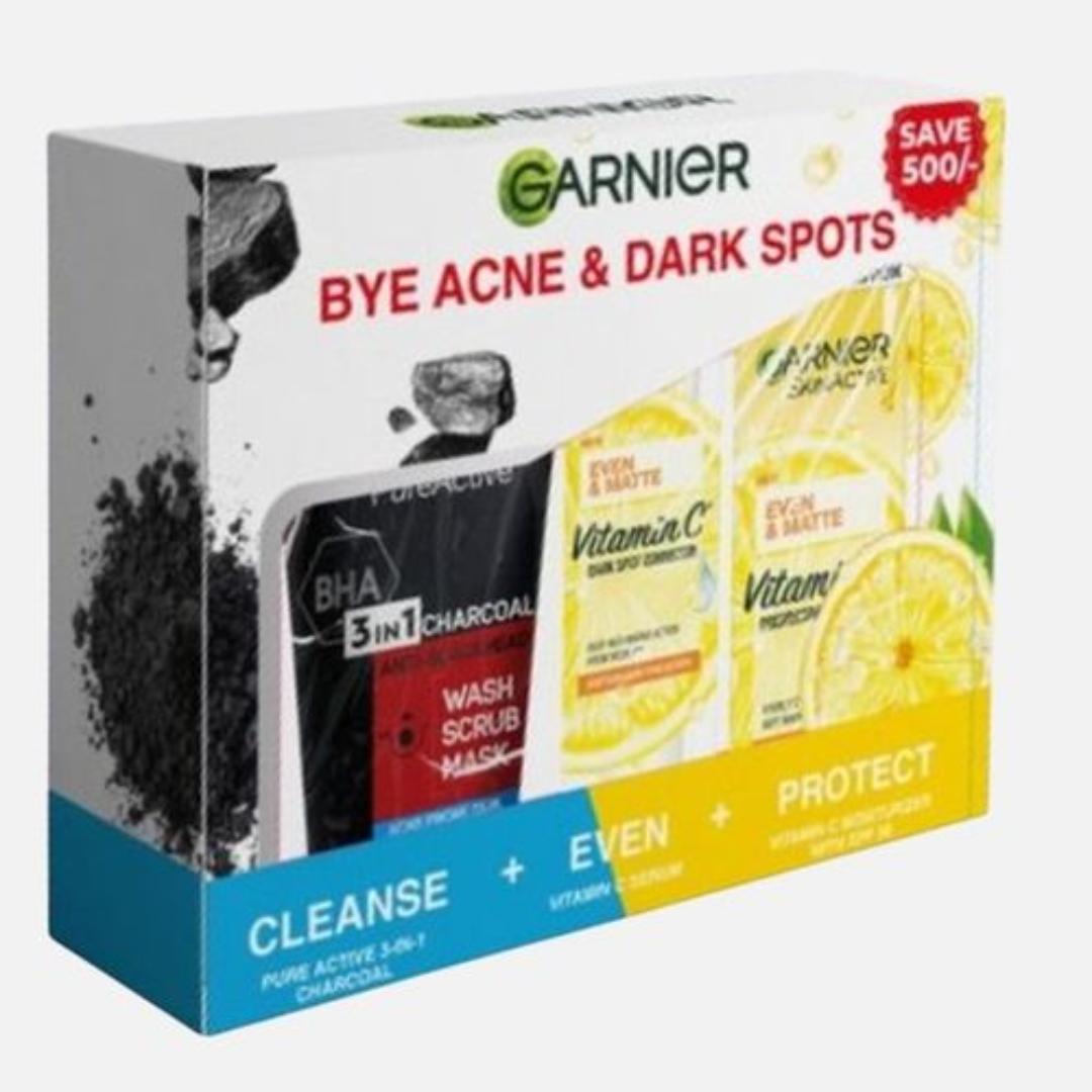 Garnier Bye Acne & Dark Spots Skin Care Kit: 3 In 1 Charcoal Cleanser 150ml + Vitamin C Brightening Booster Face Serum + SPF30 UV Protective Sunscreen 50ml
