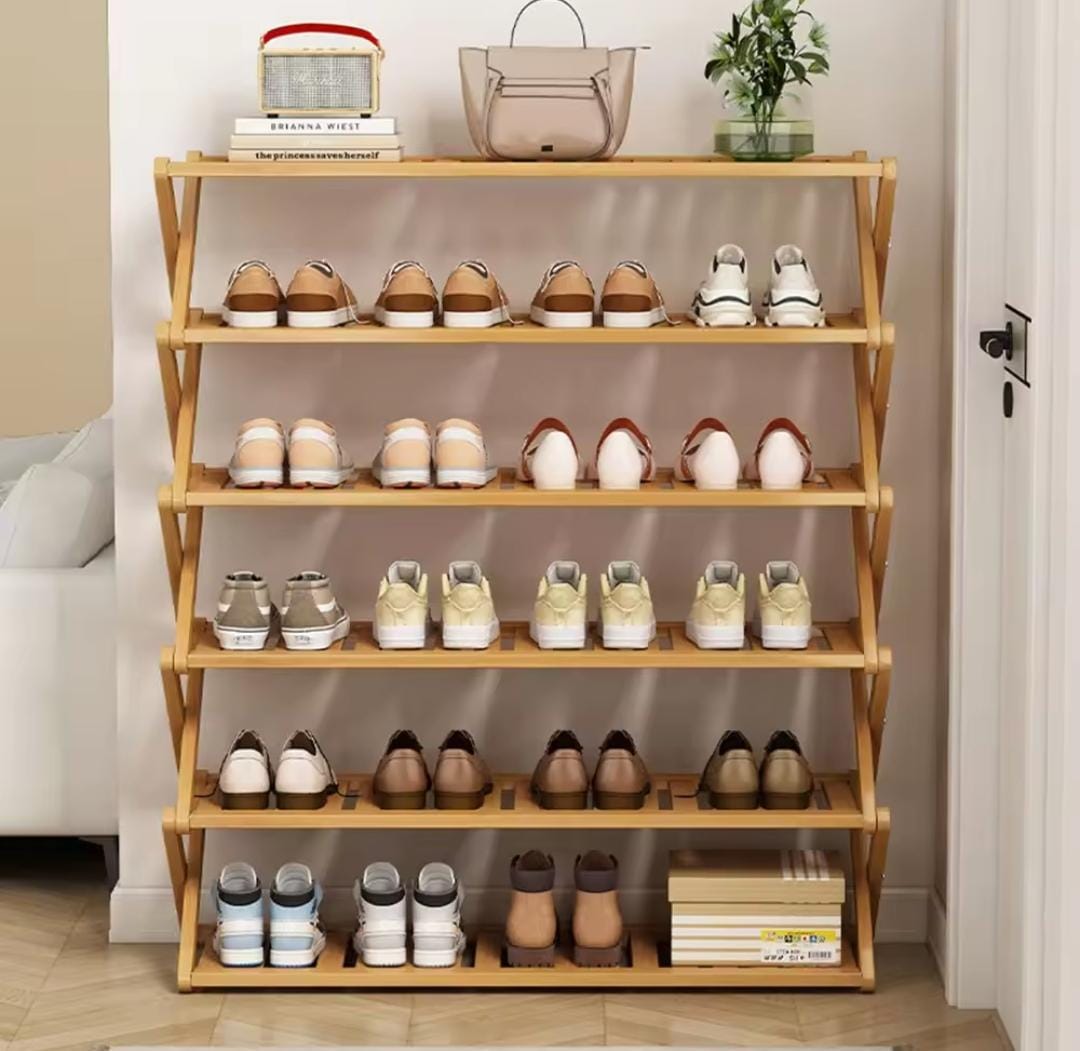 Strong and durable Foldable 6 Layers Bamboo shoe rack/Organizer....made of wood and the size of Length 70cmxwidth 30cm Height 100cm.
