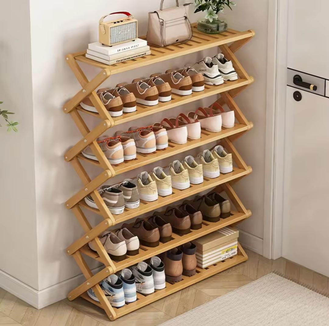 Strong and durable Foldable 6 Layers Bamboo shoe rack/Organizer....made of wood and the size of Length 70cmxwidth 30cm Height 100cm.