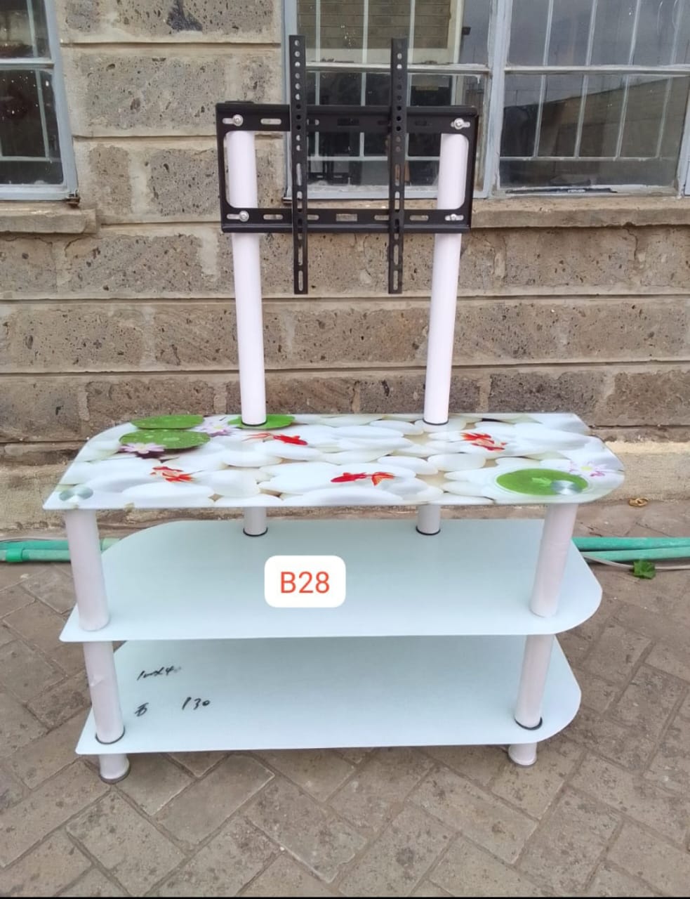 Classy Glass tampered TV Stand with TV Mount....easy to mount
