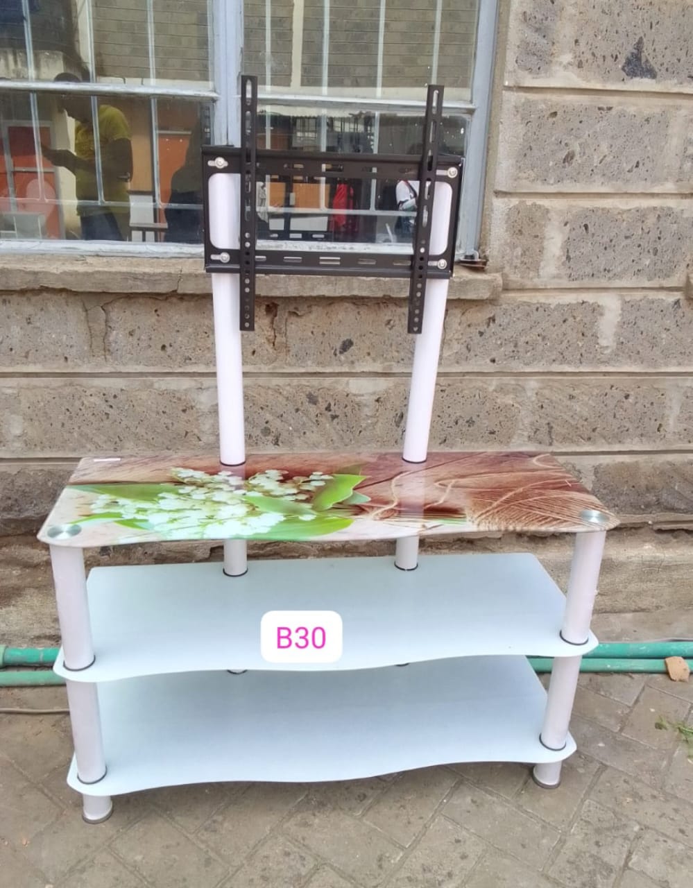 Classy Glass tampered TV Stand with TV Mount....easy to mount