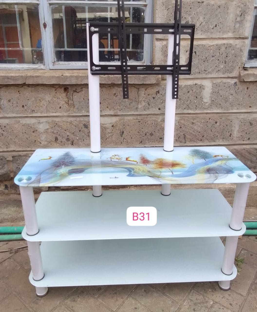Classy Glass tampered TV Stand with TV Mount....easy to mount