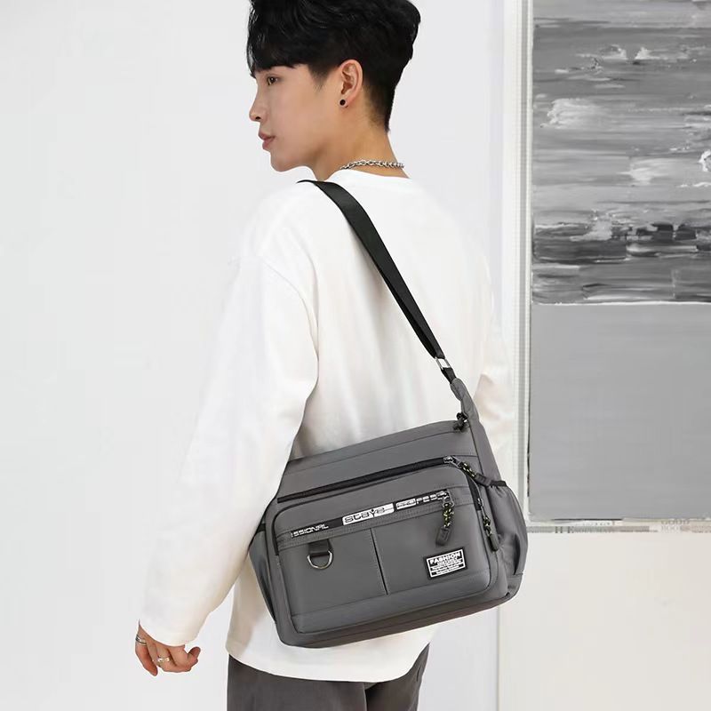 New large capacity men's shoulder bag, waterproof and wear-resistant backpack, multi pocket business and leisure men's crossbody bag