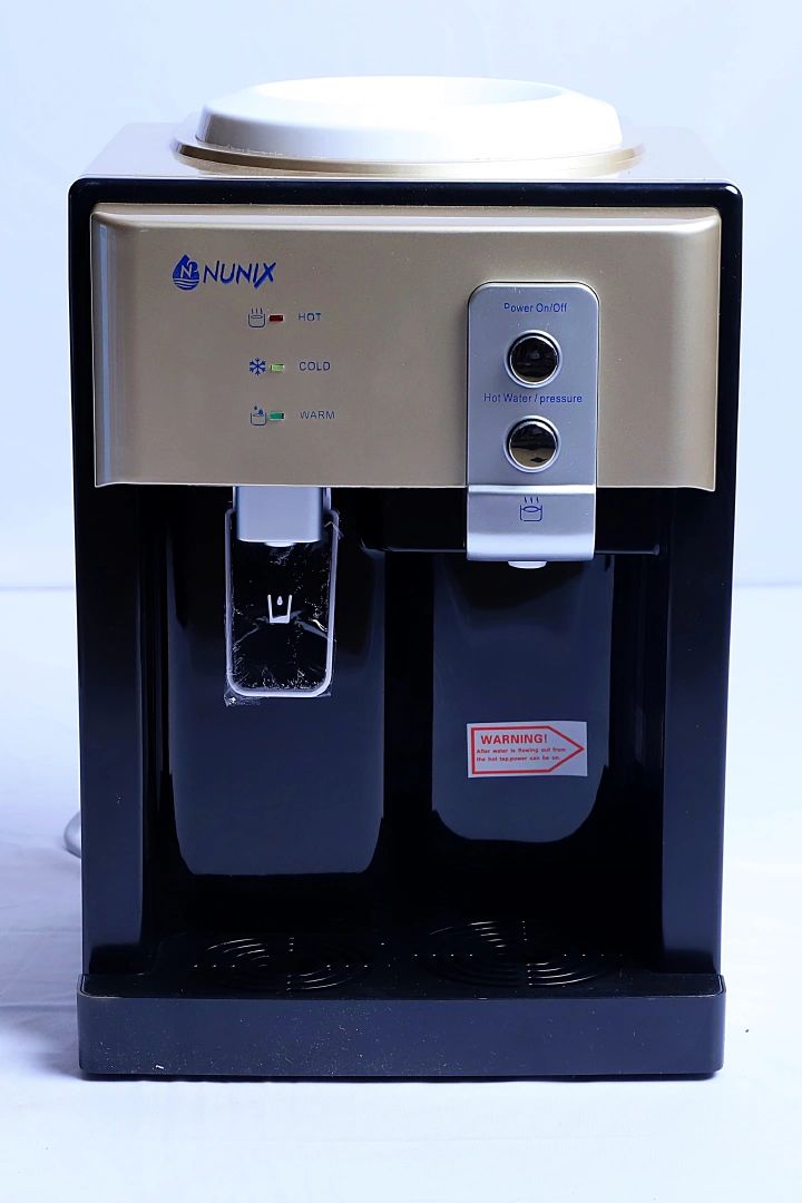 Z4 Nunix Table Top Hot And Normal Water Dispenser With stainless steel tank suitable for all homes and offices champagne colr