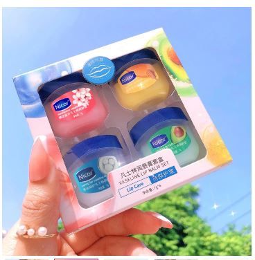 Buy 1 and get a free gift Vaseline Lip Balm Moisturizing Lipstick Base Moisturizer Makeup Natural Plant Anti-Cracking Lip Care Petroleum Jelly Lip Balm