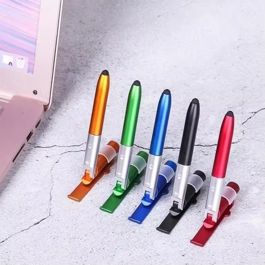 2pcs/lot  4 In 1 Multifunction Ballpoint Pen with LED Light Fold Phone Holder Night Read Writing Pencil Office School Student Stationery