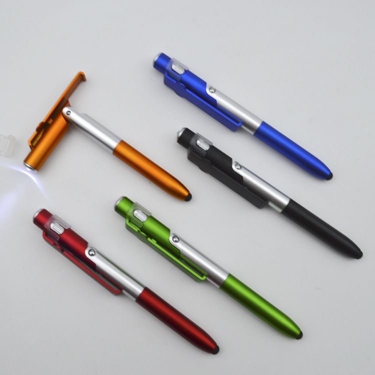 2pcs/lot  4 In 1 Multifunction Ballpoint Pen with LED Light Fold Phone Holder Night Read Writing Pencil Office School Student Stationery