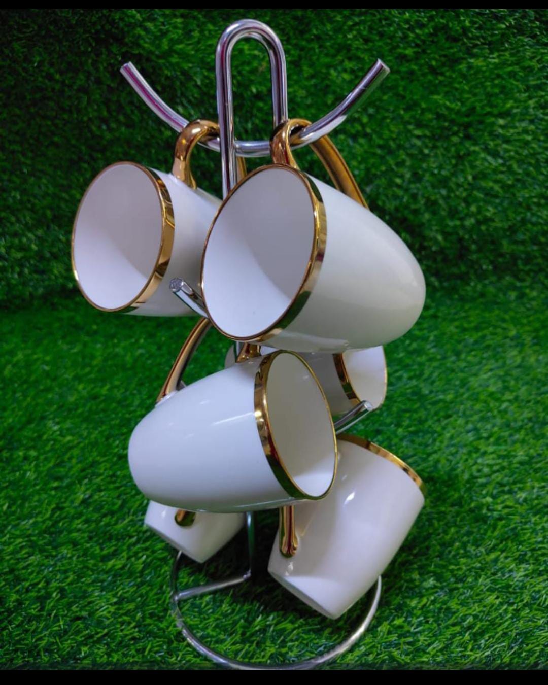 Classic 6 Cup Holder Mug Holder Cup Stand- Stainless Steel  This mug tree stores and displays up to six of your favorite coffee mugs and teacups in a fashionable manner. Made from stainless steel, the