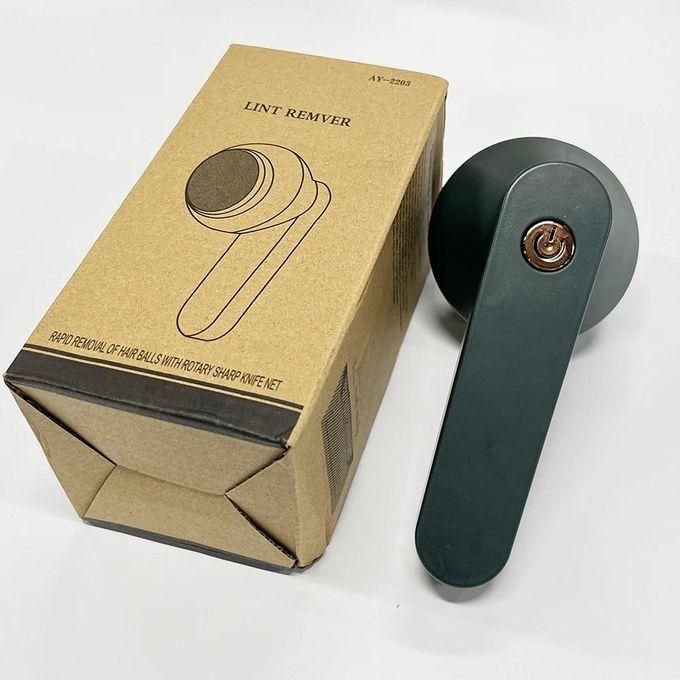 Electric Lint Remover Fabric Shaver : A compact and easy-to-use fabric shaver with rotating inner blades, designed to remove lint and fuzz from clothing efficiently.