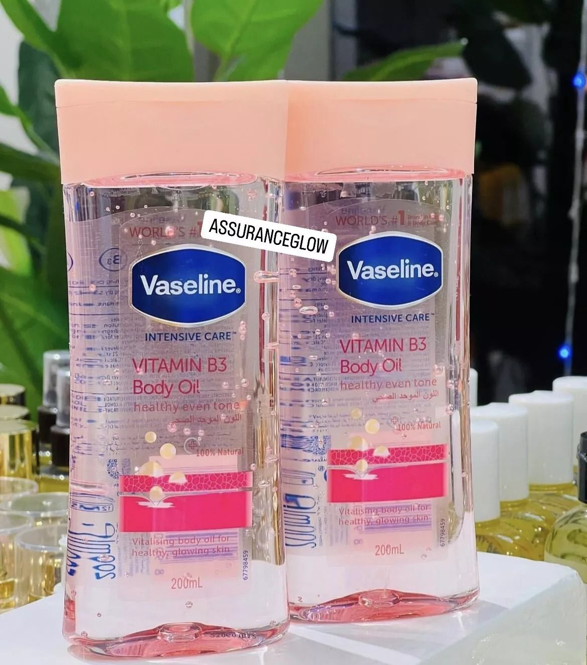 2 Packs Vaseline Daily Brightening Even Tone Body Lotion + Oil for Glowing Skin, with Vitamin B3 & Triple Sunscreens - 400ml For Radiant Looking Skin in 2 Weeks Vaseline Body Lotion 400ml + 200ml