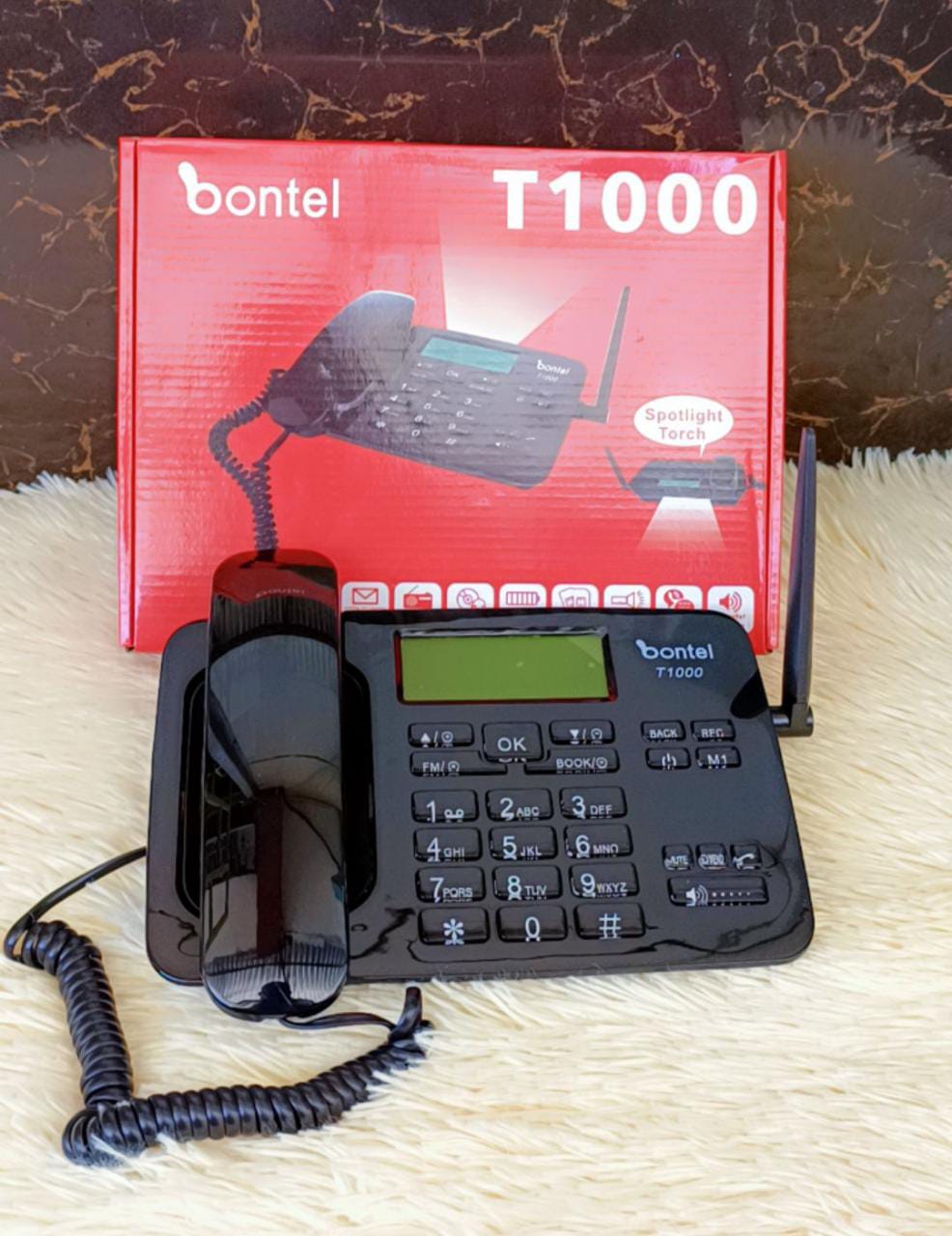 BONTEL T100 WIRELESS HOME/OFFICE PHONE -  High capacity phone book, SMS functionality, Call history, Caller ID,Loud speaker, Caller ID, redial and handsfree function, Different ring tones and alarm.