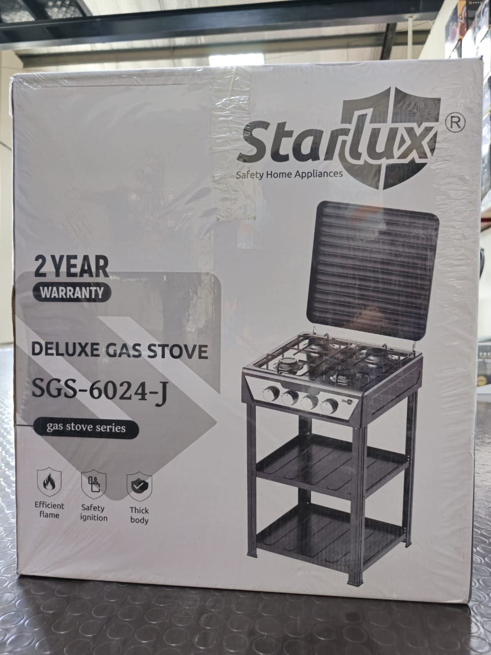 Starlux 4 Burner Deluxe Standing Gas Stove Cooker With Shelves - Four-burner, safe, efficient, Sleek, durable design, Versatile, reliable cooking, Easy to clean.