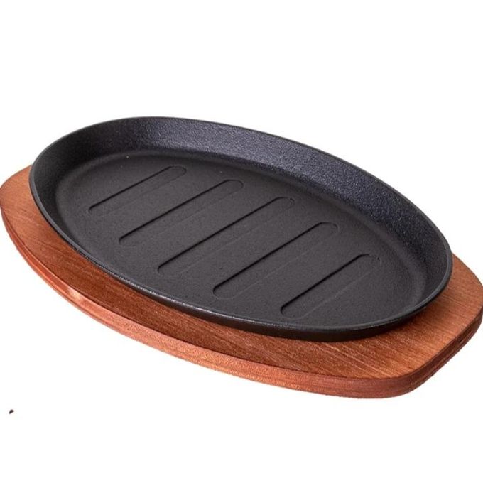 Cast Iron Hot Sizzling Plate on Wooden Tray
