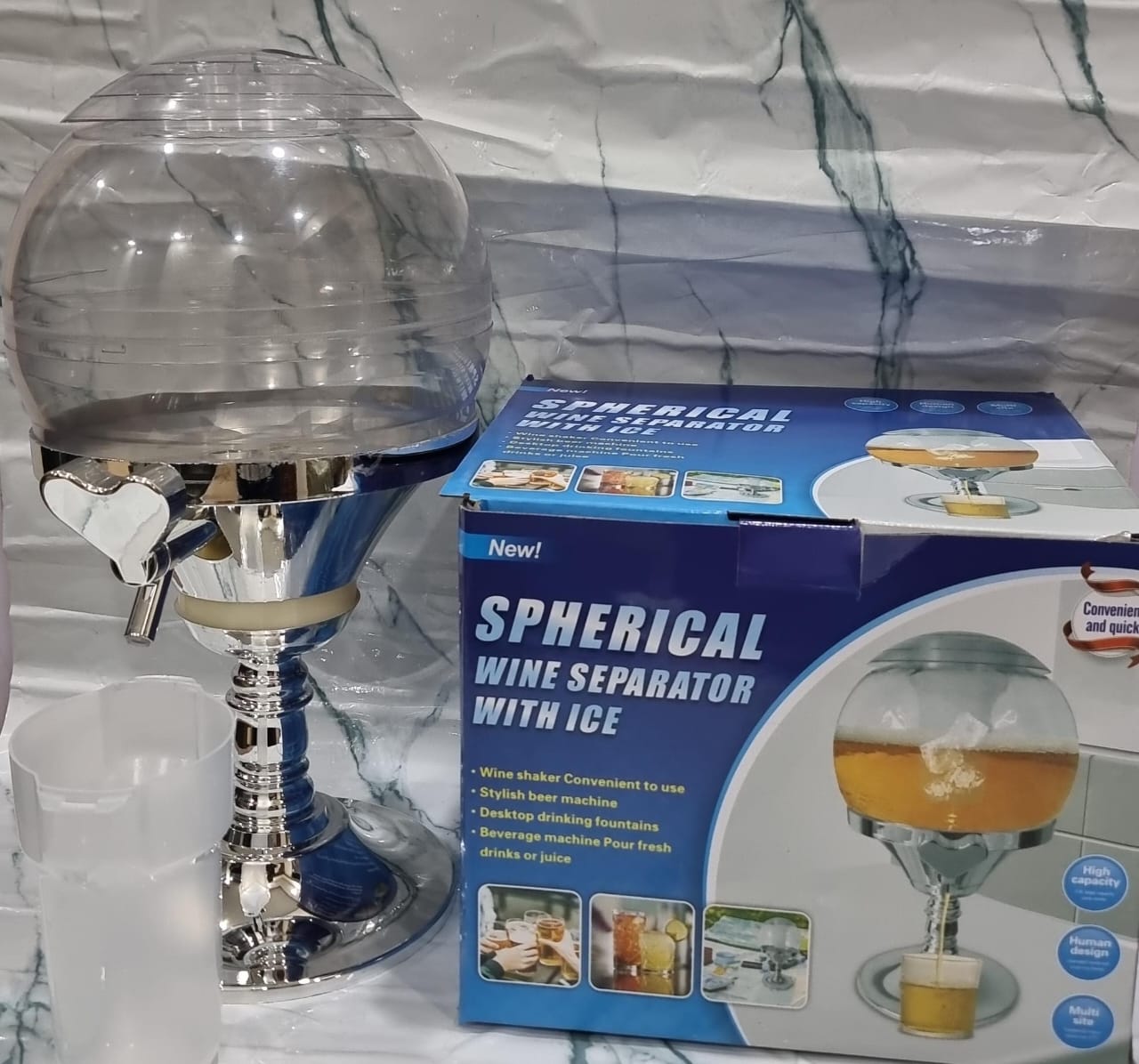 Classy Cooling Spherical wine juice or liquid dispenser with ice slot and separator