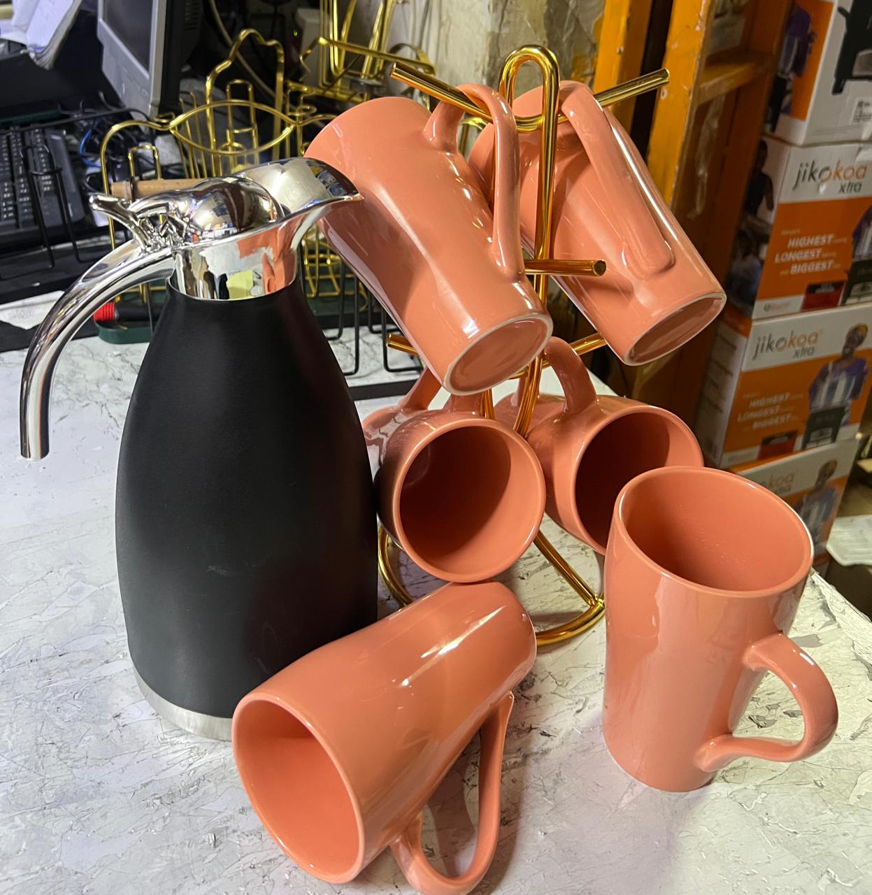 6 pcs ceramic mugs &2 litres flask The stand which brings elegance to your kitchen and dining table. 
The tea set is made to satisfy the user in terms of elegance and splendor.