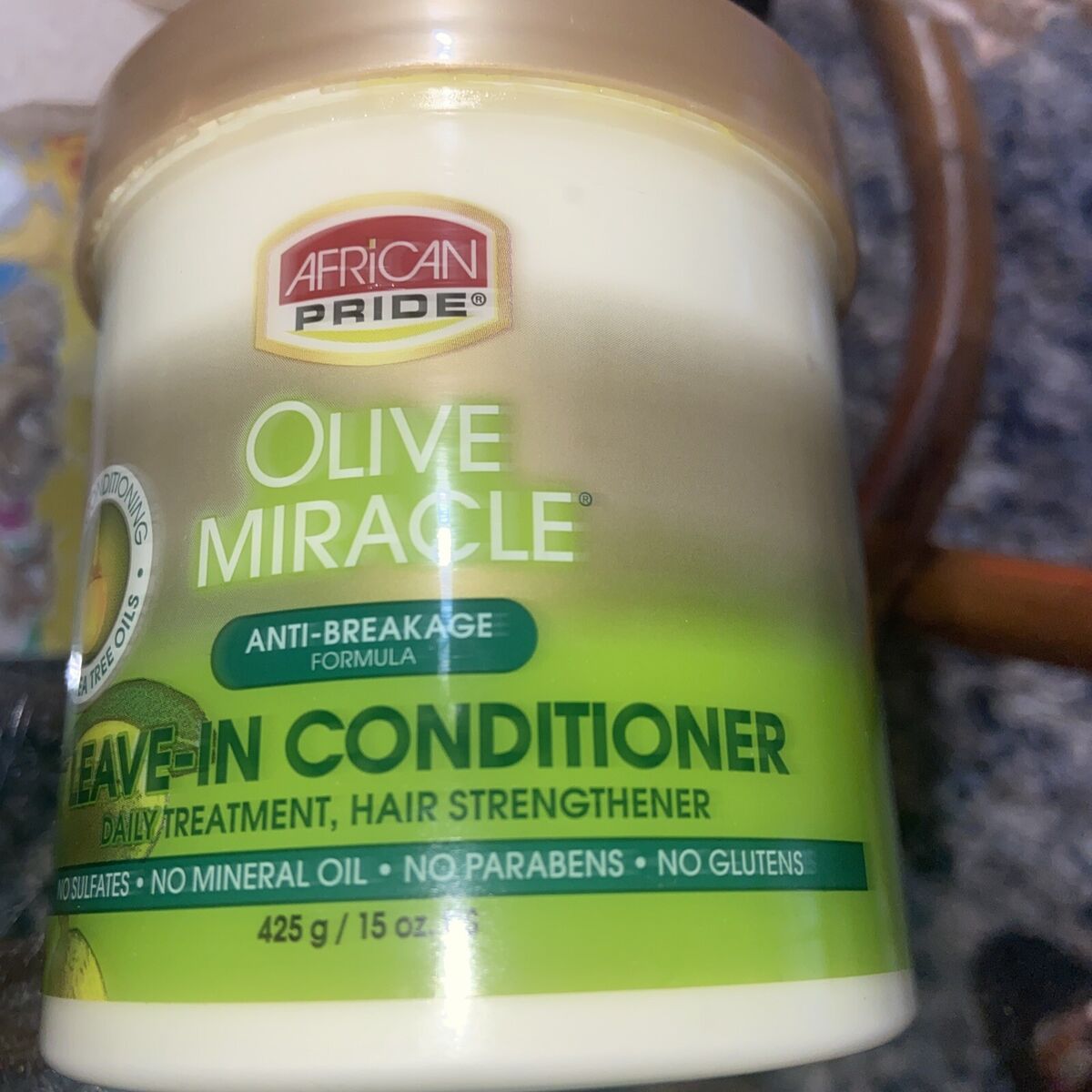 AFRICAN PRIDE Olive Miracle Leave In Conditioner with Extra Virgin Olive oil for the ultimate in silky smooth deep conditioned hair and a moisture rich healthy scalp.