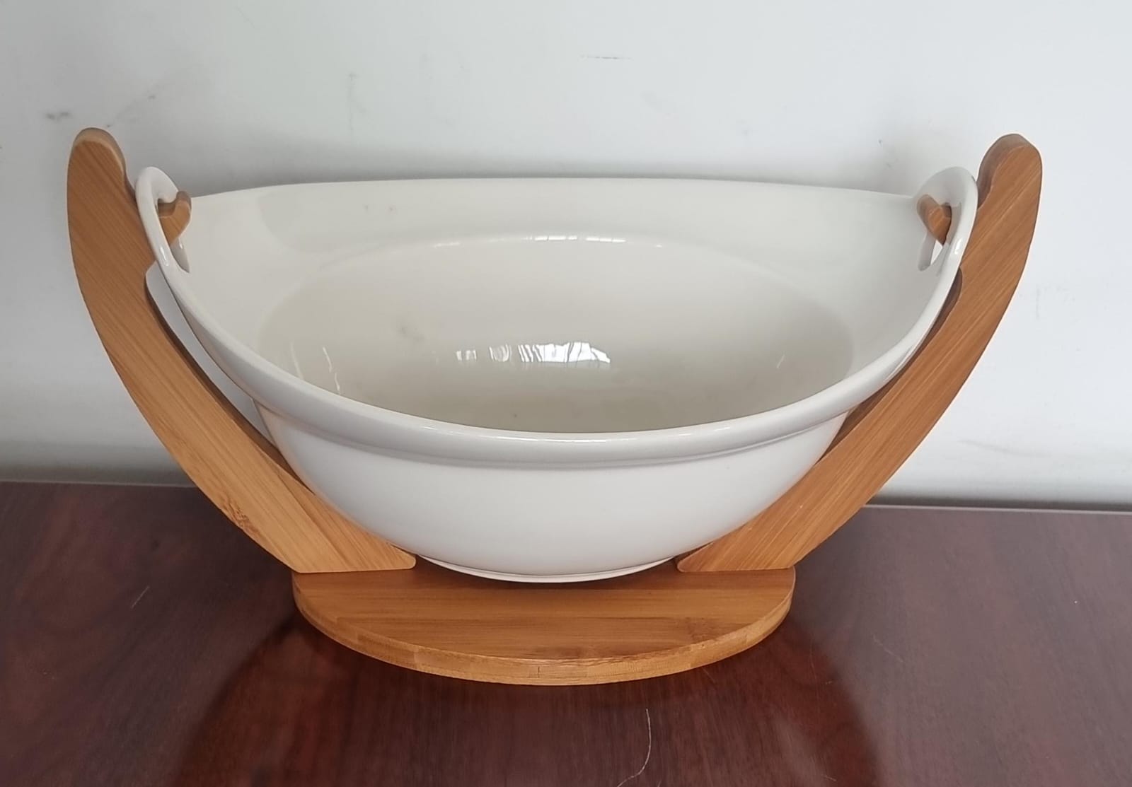 High quality medium size Ceramic table top kitchen fruits bowl with Bamboo Base stand and size of 28cm