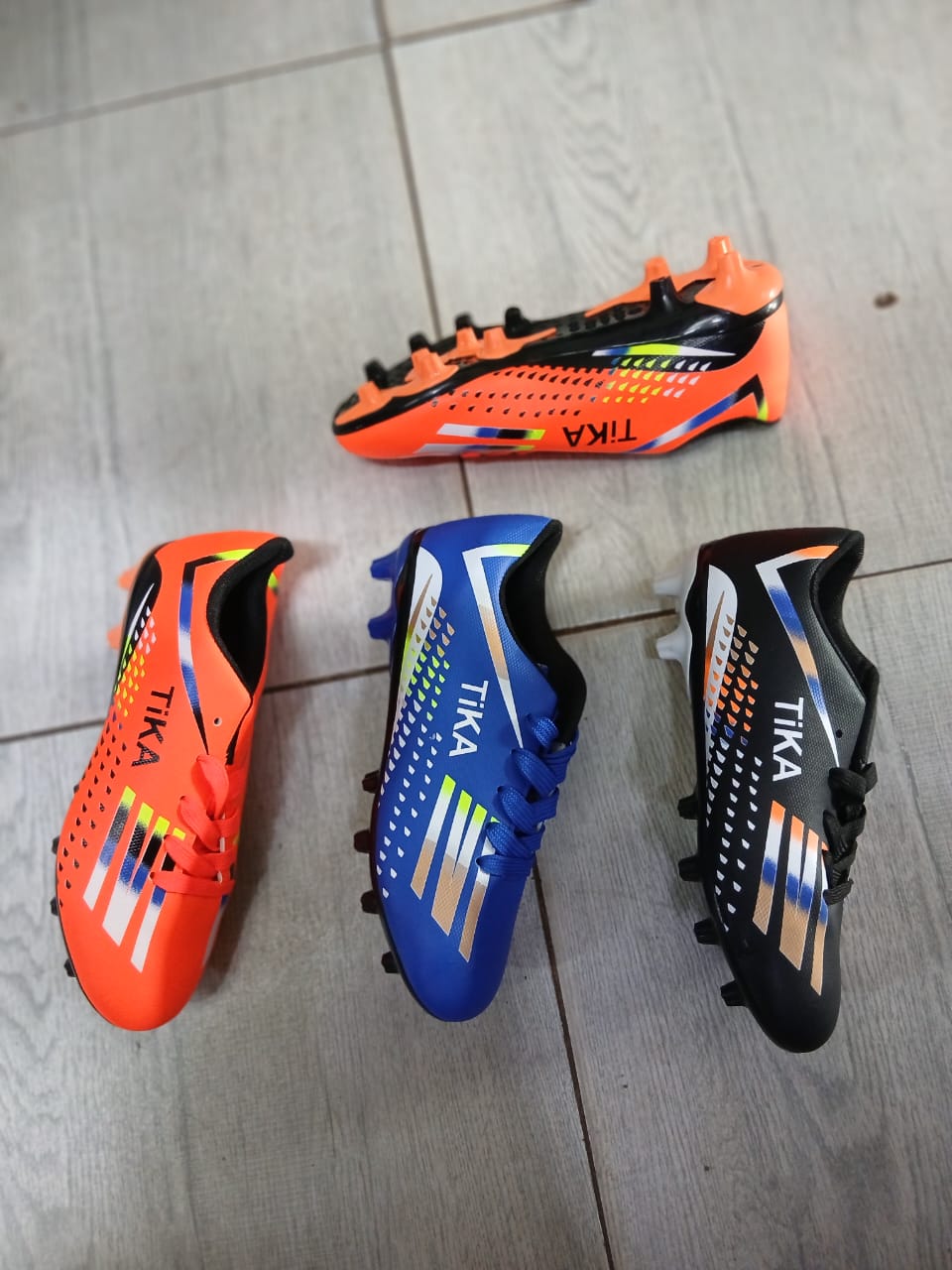 High quality TIKA comfy soccer football boots 🔥 for all men and women dreaming of  football boots favorable for playing on all grounds either carpet or dust ground ✨very cute all sizes available