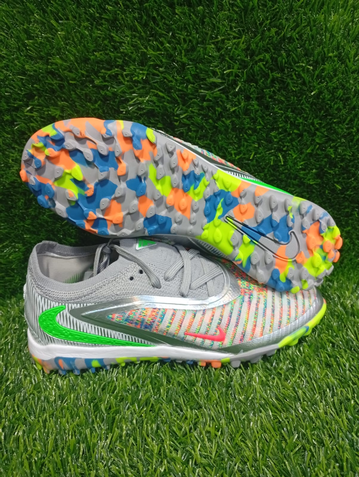 ⚽🔥 Multicolor Turf Football Shoes Maximum Grip. Maximum Style. Maximum Control Stand out on the pitch with these eye-catching turf football shoes designed for comfort, control, and strong traction