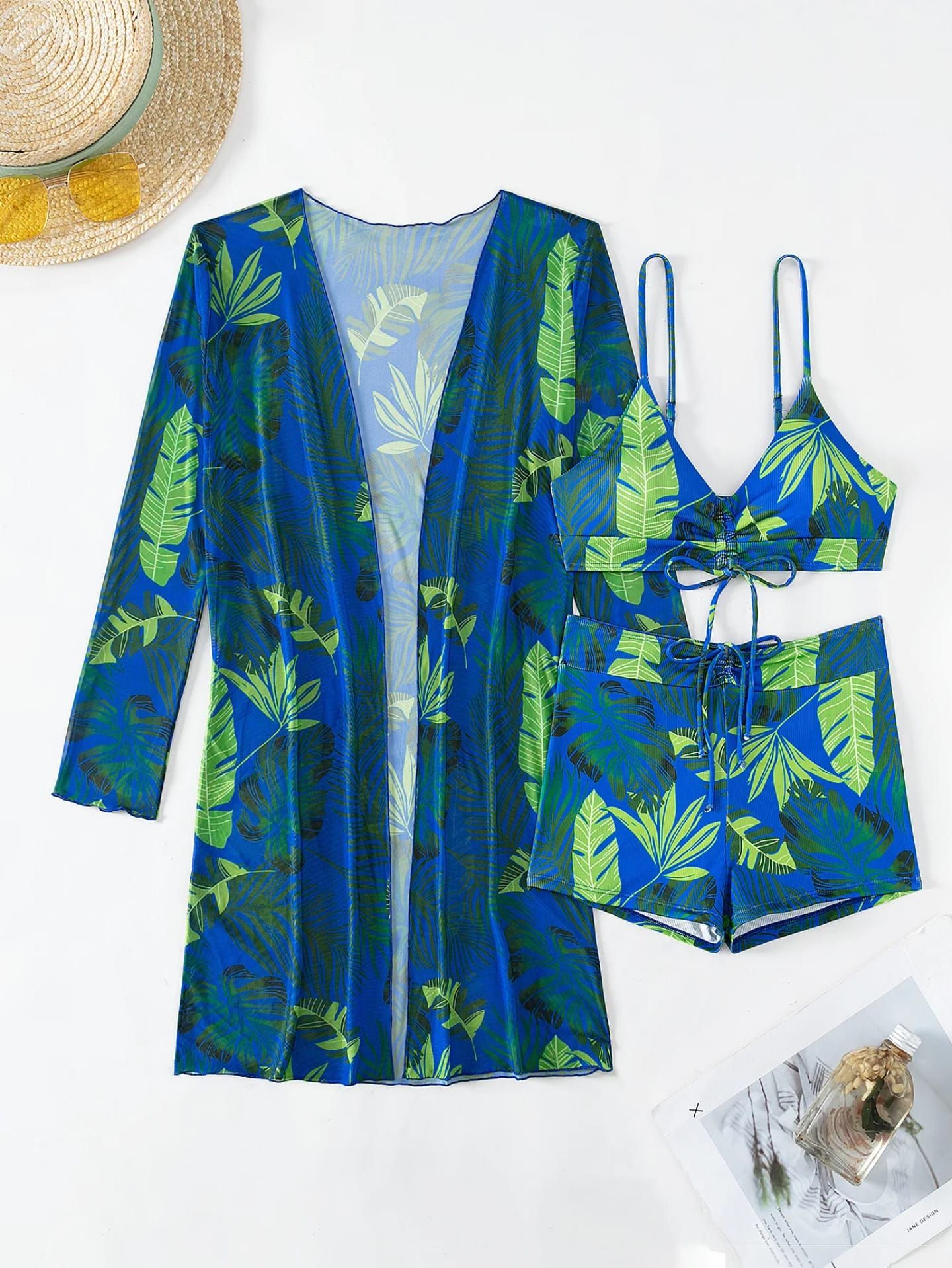 Women’s 3-Piece Tropical Leaf Print Outfit – Crop Top with Drawstring, High-Waisted Shorts & Sheer Long-Sleeve Cover-Up – Sizes S to 2XL – Stylish Summer Beachwear & Vacation Set