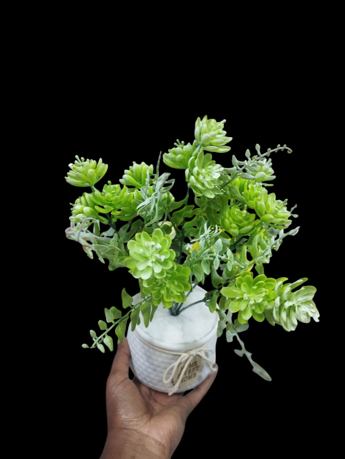Artificial Green Plant In A White Vase