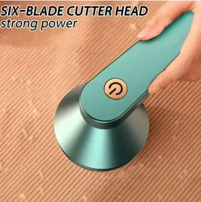Electric Lint Remover Fabric Shaver : A compact and easy-to-use fabric shaver with rotating inner blades, designed to remove lint and fuzz from clothing efficiently.