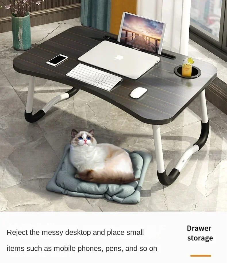 Breakfast table/work table Material -MDF Width 40cms Length 60cms Height 28cms Comes fully assembled Easy to store because the legs are foldable