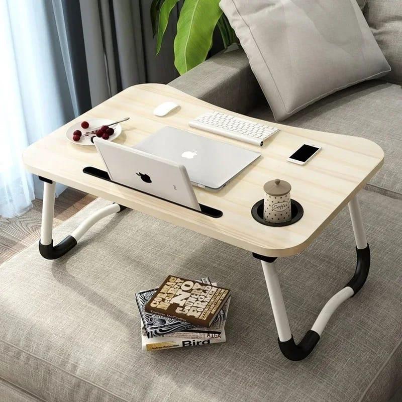 Breakfast table/work table Material -MDF Width 40cms Length 60cms Height 28cms Comes fully assembled Easy to store because the legs are foldable