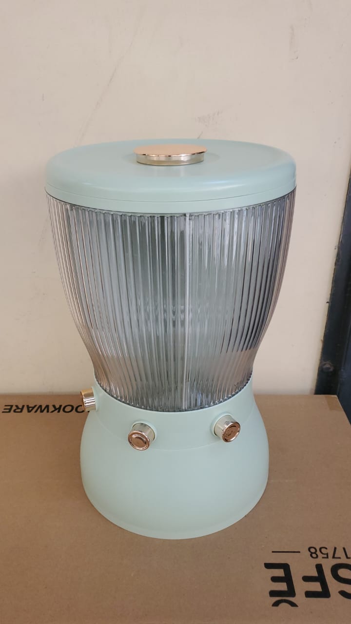 Partitioned heavy plastic and Acrylic rotating kitchen cereals dispenser with press buttons and capacity of 10KGS