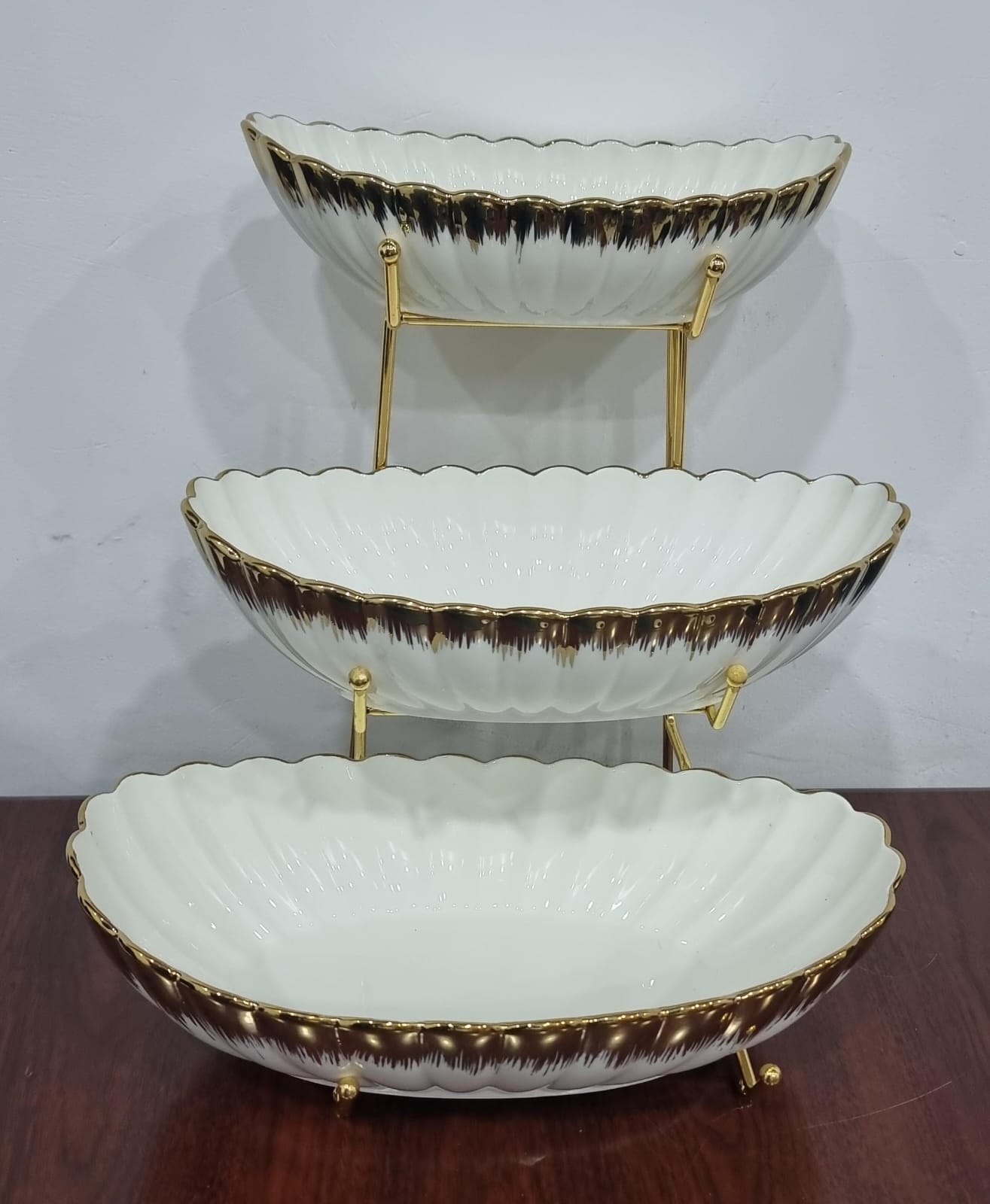 3 layers ceramic kitchen fruits bowls on gold metal rack ...bowl sizes...bottom 35cmx19cmx10cm,mid 29cmx15cmx7cm