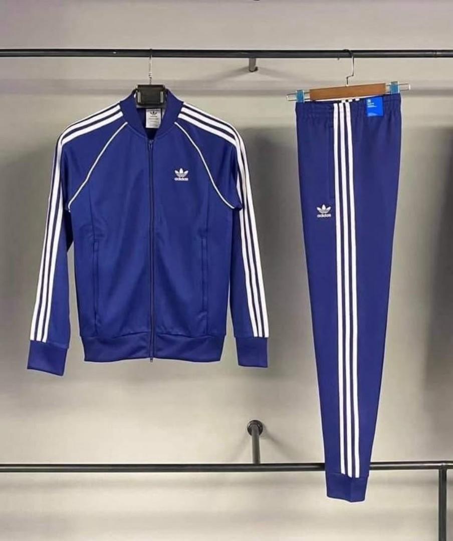 ORIGINAL BLUE ADIDAS TRACKSUIT, BLUE AND WHITE STRIPES. UNISEX, HIGH QUALITY COTTON MATERIAL. WOMEN TRACKSUITS, MEN TRACKSUITS, KIDS TRACKSUITS. SPORTS TRACKSUITS