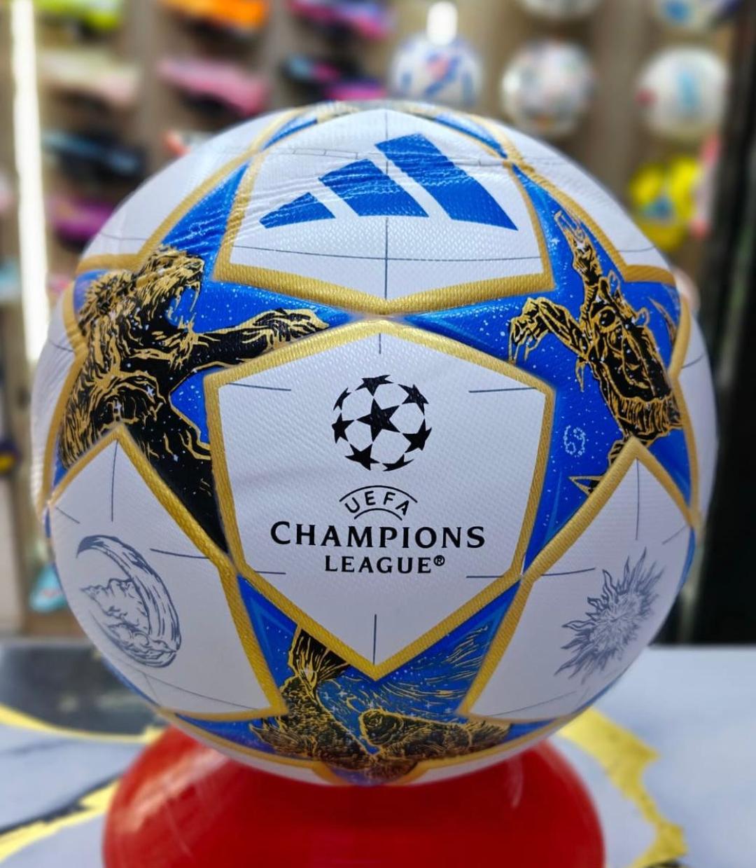 🔥 Adidas 2025/2026 UEFA Champions League soccer ball, featuring a design with white stars outlined in gold and blue panels.Match Soccer Ball (White/Red) (3) Soccer ball New Size 5. Football for train
