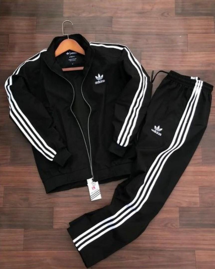 ORIGINAL BLACK ADIDAS TRACKSUIT, BLACK AND WHITE STRIPES. UNISEX, HIGH QUALITY COTTON MATERIAL. WOMEN TRACKSUITS, MEN TRACKSUITS, KIDS TRACKSUITS. SPORTS TRACKSUITS