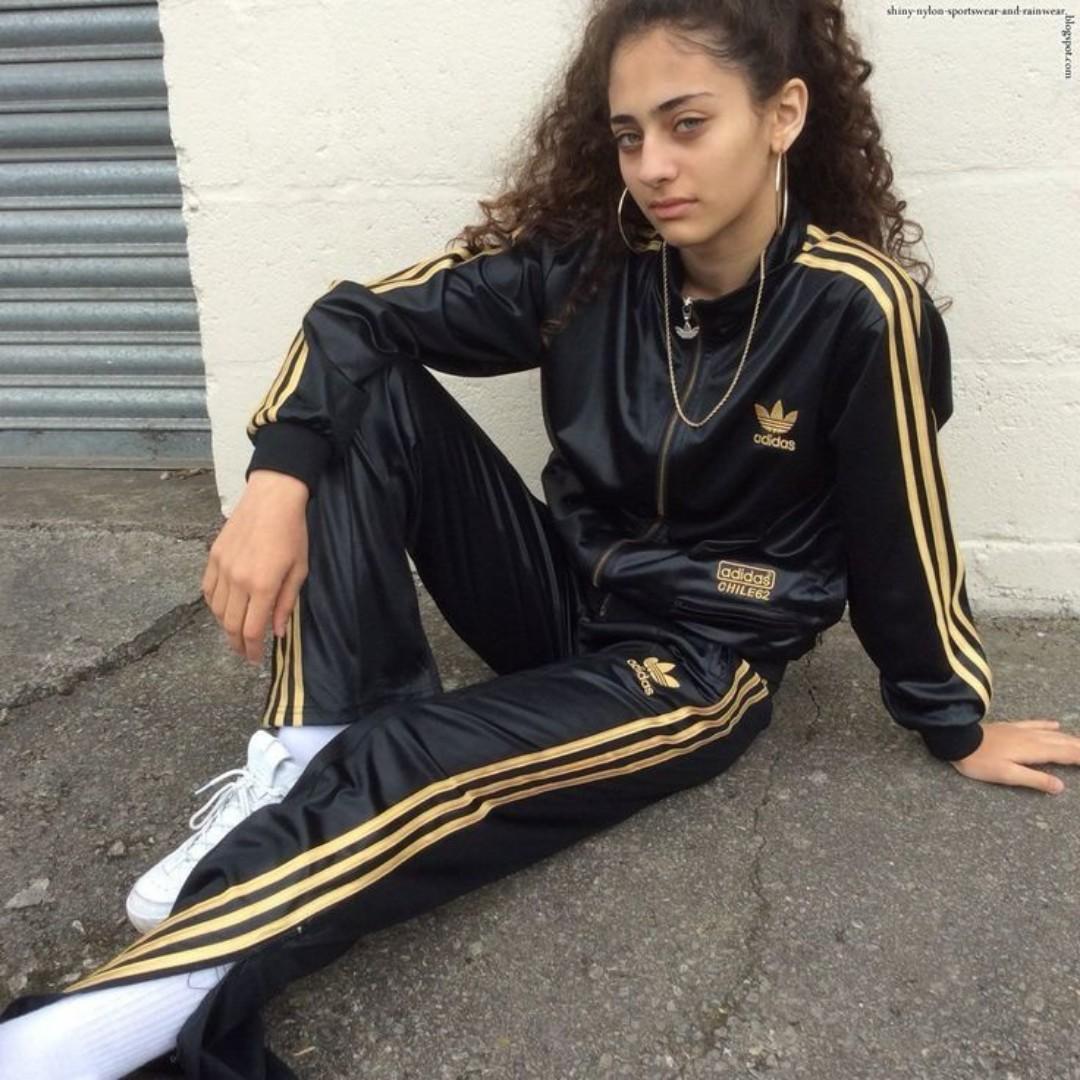ORIGINAL BLACK ADIDAS TRACKSUIT, BLACK AND GOLD STRIPES. UNISEX, HIGH QUALITY COTTON MATERIAL. WOMEN TRACKSUITS, MEN TRACKSUITS, KIDS TRACKSUITS. SPORTS TRACKSUITS