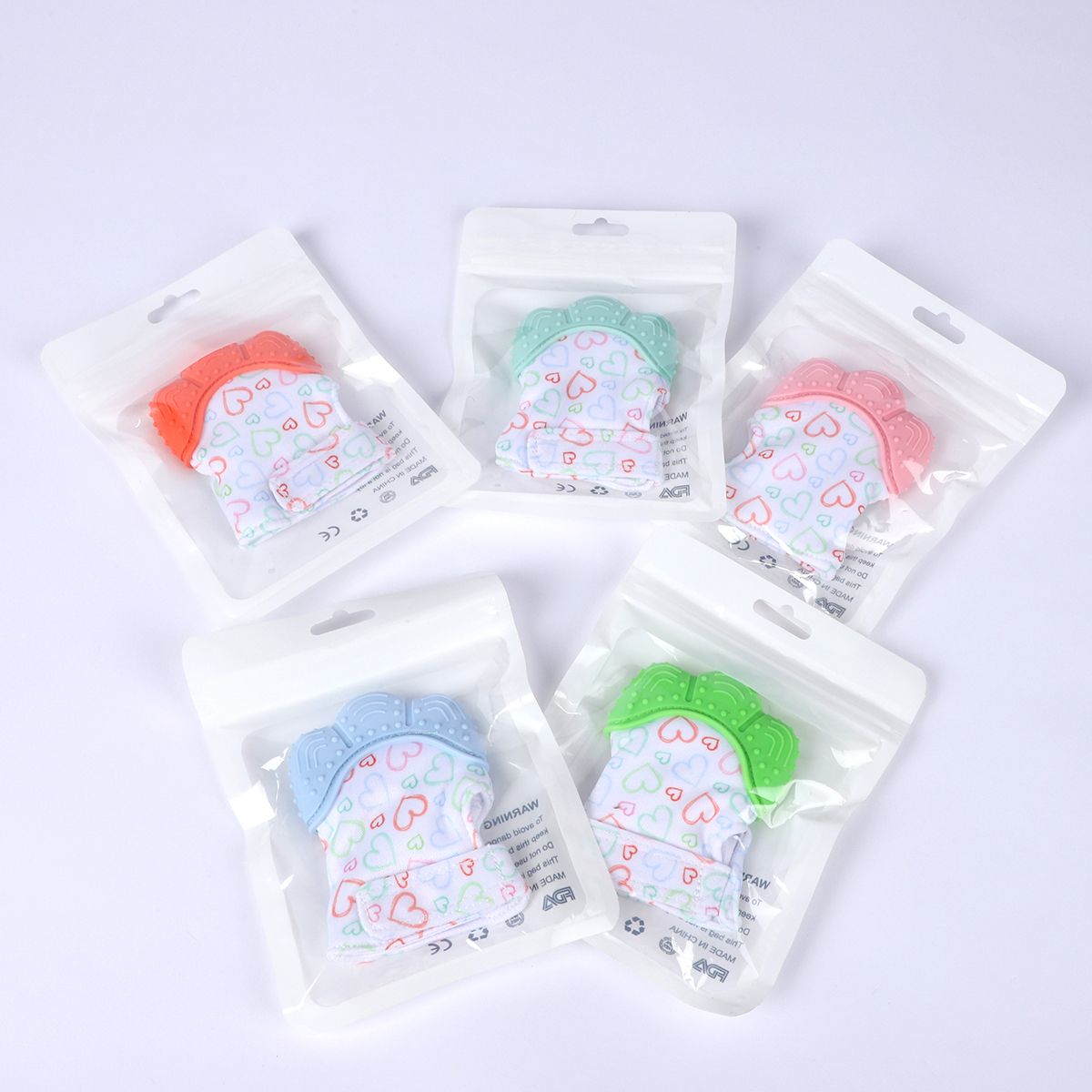 Baby Silicone Teething Glove – Soothing Relief. Let your little one teethe in comfort and joy with our Baby Silicone Teething Glove – the perfect blend of safety, softness, and sensory fun 0-12 Months