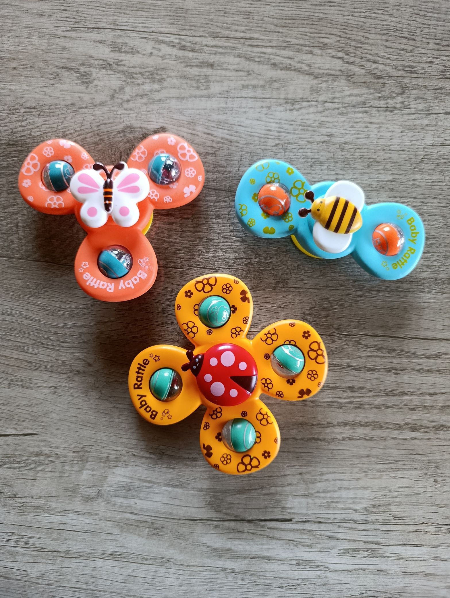 3 Piece Spinning Developmental & Sensory Fidget Toys with Suction 6M+ Travel Friendly 
Sticks to Tiles, Glass and ABS
 BPA Free