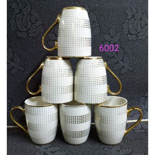 OFFER PRICE !!! Gold mugs 6pcsUpgrade your drinkware collection with this 6pcs ceramic cups set, designed to bring style and durability to your tea and coffee moments. Perfect for daily use