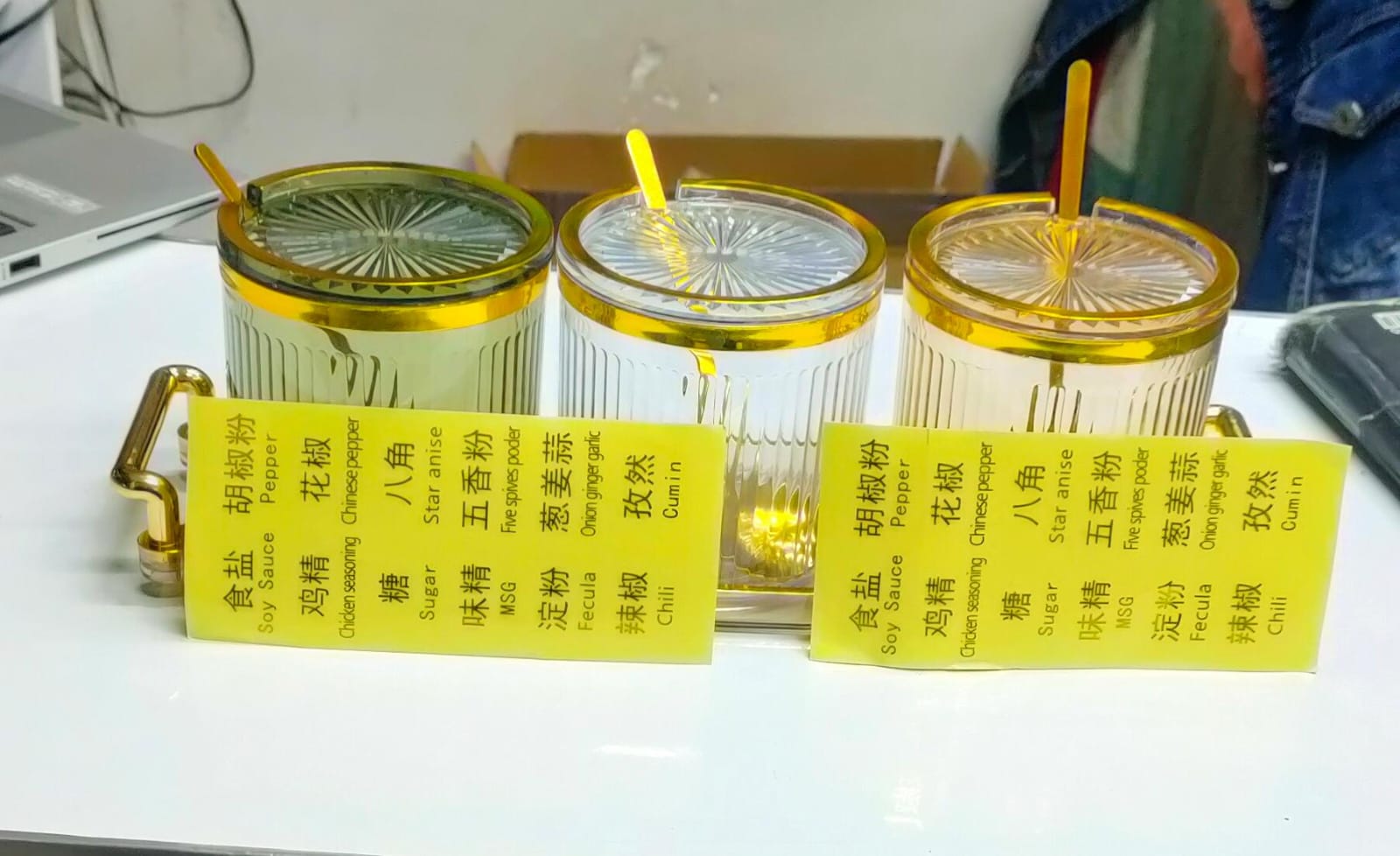 4 in 1 Acrylic seasoning set ideal for spices, sugar etc.                                             Includes cute spice stickers, Tray, 3 cans and 3 tea spoons