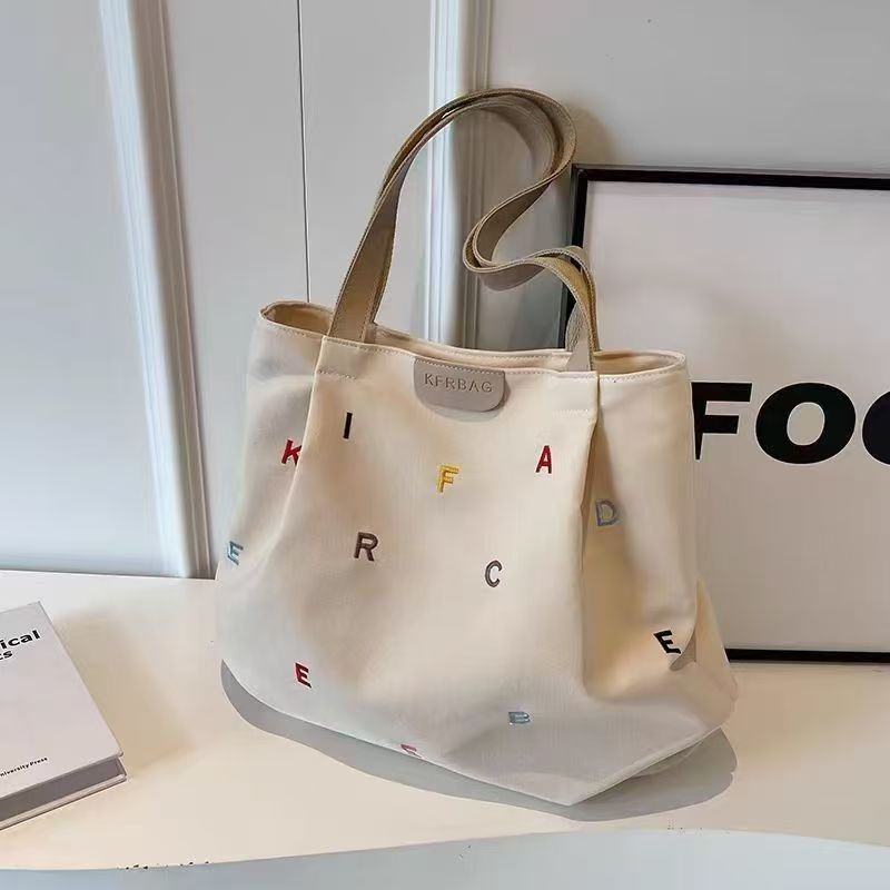Large-capacity Canvas Bag For Women, 2025 New Style, Trendy Embroidered Letters, Handbag For Carrying On The Shoulder, Small And Fresh Style Tote Bag. The Highest Quality On The Entire Internet.