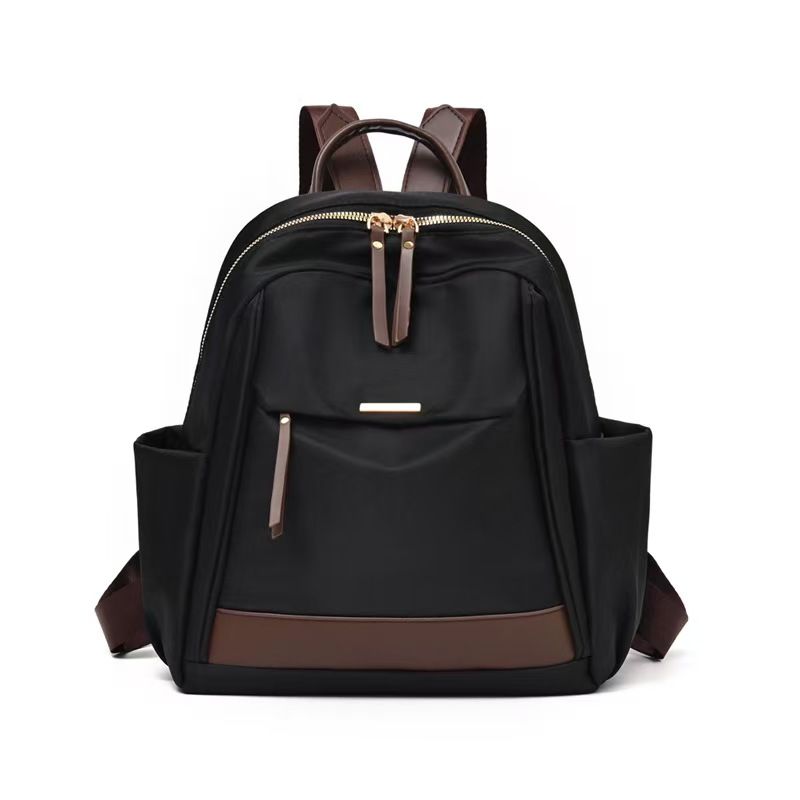 The New Ladies' Double-shoulder Bag Is A Large-capacity, Lightweight, Casual Travel Backpack Made Of Nylon, Featuring A Simple Design Suitable For Commuting And Studying. It Has The Top Quality Among