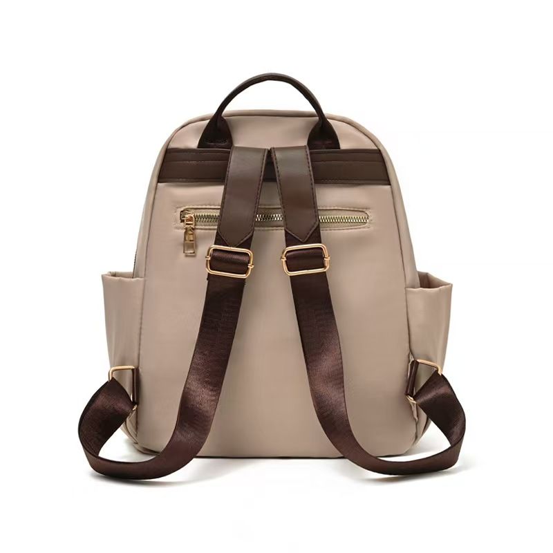 The New Ladies' Double-shoulder Bag Is A Large-capacity, Lightweight, Casual Travel Backpack Made Of Nylon, Featuring A Simple Design Suitable For Commuting And Studying. It Has The Top Quality Among