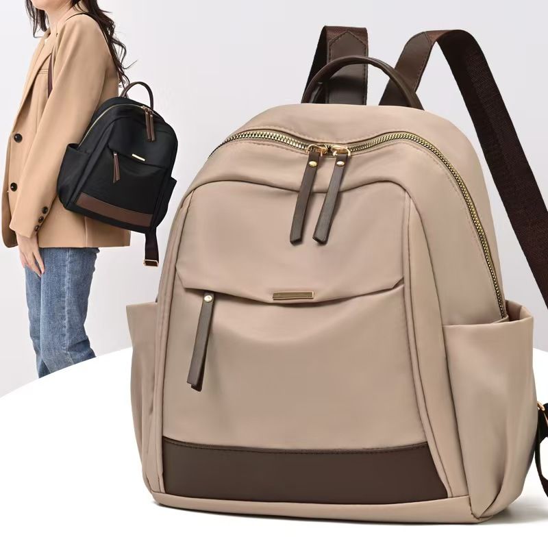 The New Ladies' Double-shoulder Bag Is A Large-capacity, Lightweight, Casual Travel Backpack Made Of Nylon, Featuring A Simple Design Suitable For Commuting And Studying. It Has The Top Quality Among
