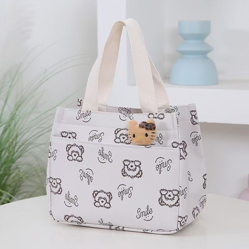 The New Cartoon-printed Handbag Is A Large-capacity Shoulder Bag, Trendy And Fashionable. It Is Also A Briefcase for Office Workers. It Is The Top-Quality Product On The Entire Online Market.