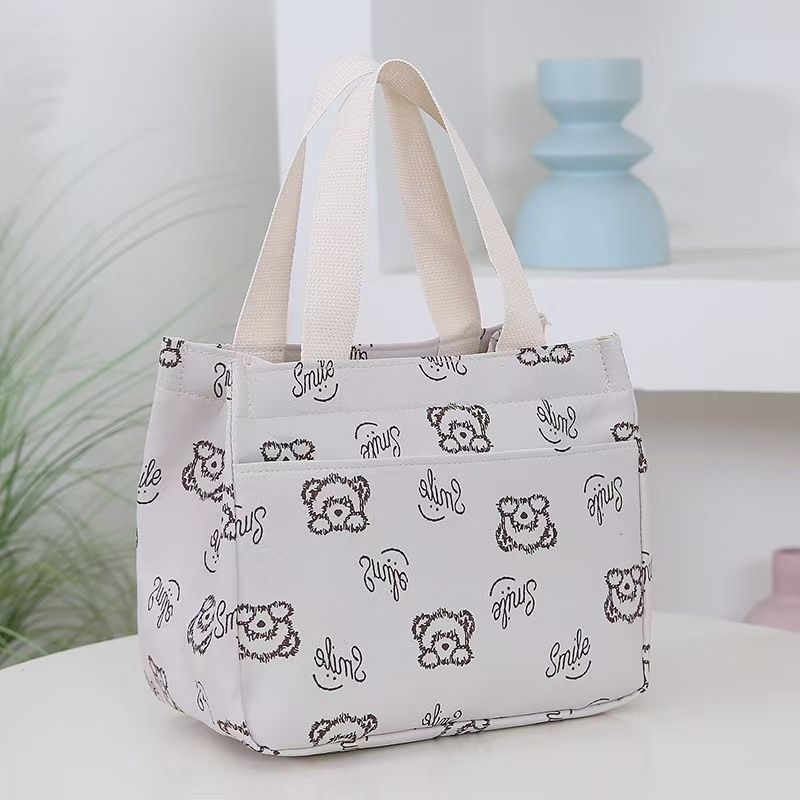 The New Cartoon-printed Handbag Is A Large-capacity Shoulder Bag, Trendy And Fashionable. It Is Also A Briefcase for Office Workers. It Is The Top-Quality Product On The Entire Online Market.