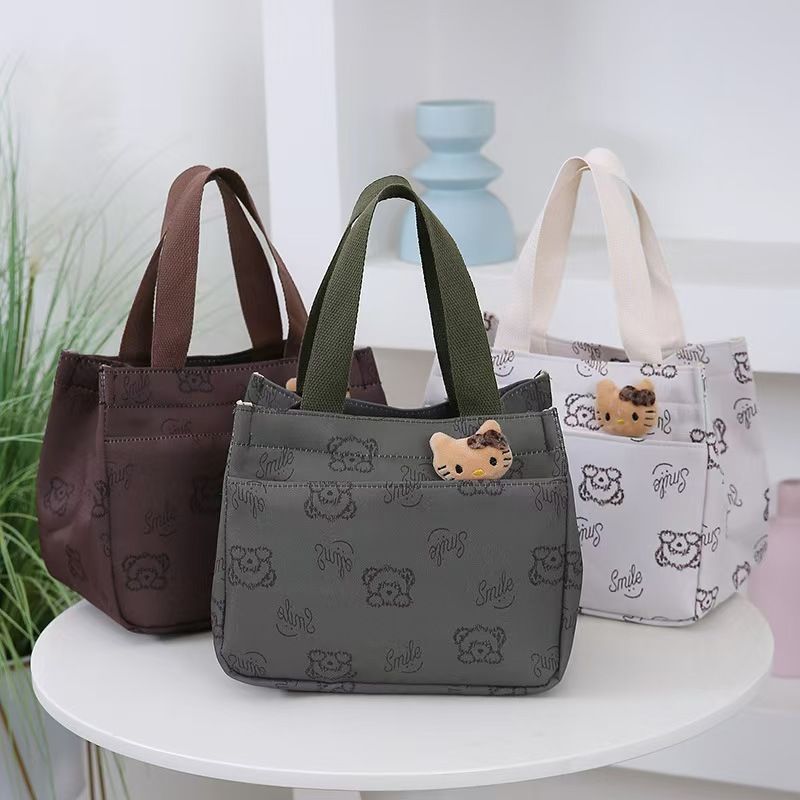 The New Cartoon-printed Handbag Is A Large-capacity Shoulder Bag, Trendy And Fashionable. It Is Also A Briefcase for Office Workers. It Is The Top-Quality Product On The Entire Online Market.